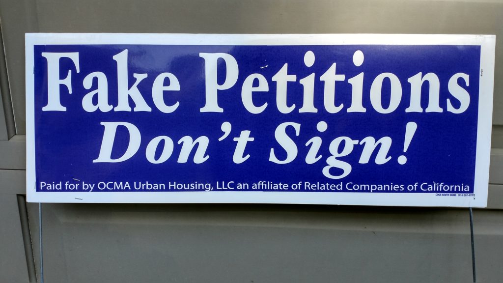 A “fake petition” sign. — NB Indy file photo © 