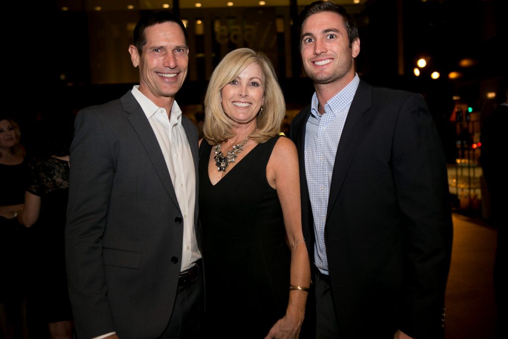 USC All American Paul McDonald (and NFL star quarterback with the Cleveland Browns and Dallas Cowboys) with wife Allyson and son Andrew