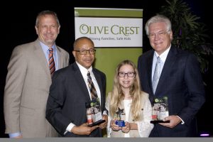 (left to right) Donald Verleur, Olive Crest CEO, Gary Taylor, Orange County Director of Children & Family Services, Grace Cross, an Outstanding Girl Scout and Role Model, and Dennis Kuhl, Chairman Angels Baseball.