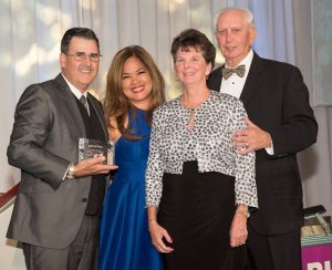 Community Honorees Burton and Linda Young with A December to Remember Co-Chairs Lucy and Roger Lisabeth