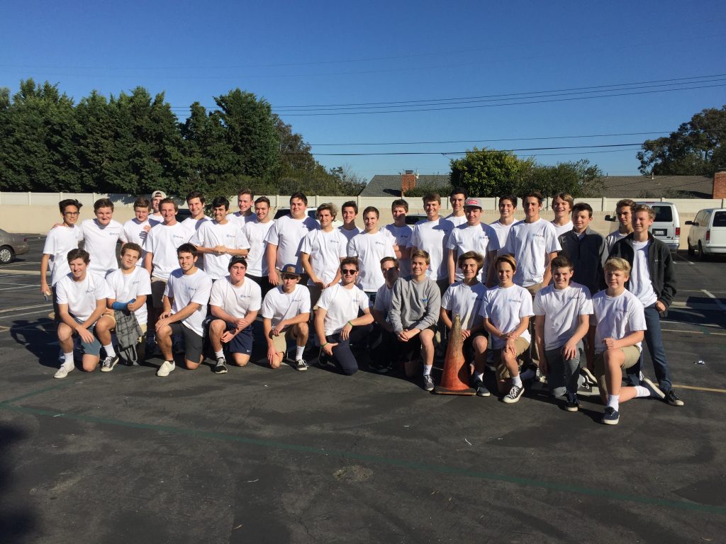 Members of the Newport-Mesa chapter of the National League of Young Men pose for a group photo during a charitable event on Saturday.  — Photo courtesy of NLYM ©