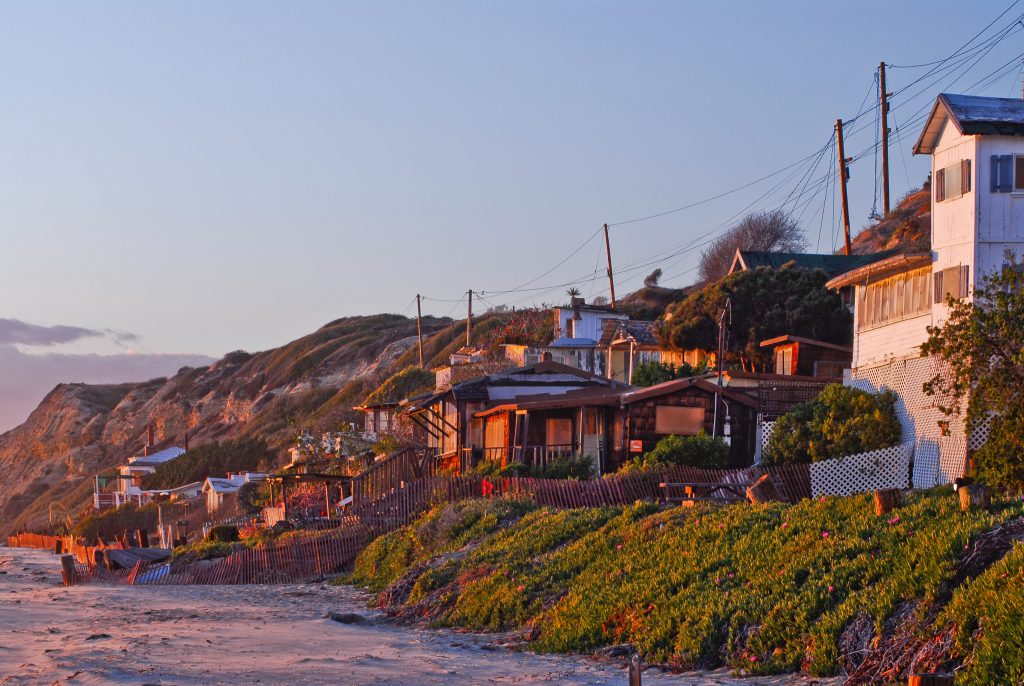 Some of the Crystal Cove cottages to be restored on North Beach. The Crystal Cove Alliance is seeking a permit for the restoration, among other work at the park, which will be heard by the California Coastal Commission on Wednesday. — Photo courtesy Crystal Cove Alliance ©