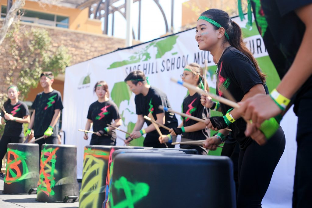 Sage Hill students Josh Lee, Albert Son, Justin Sung, Mary Shin, Sarah Kim, Ashley Chung, Stephanie Yang, Daniel Min, Alex Kwon, and Yuna Baek, perform Korean Nanta, incorporating dance and drums. — Photo by Sara Hall ©