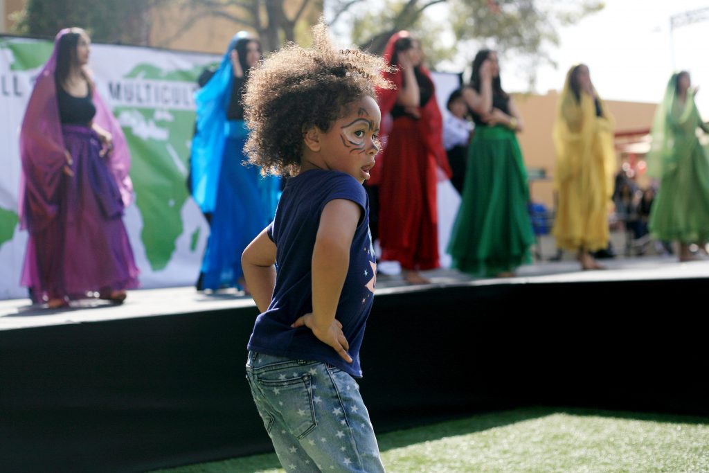 RiKayla Dillingham, 4, dances along with Sage Hill students and Persian dancers — Photo by Sara Hall ©