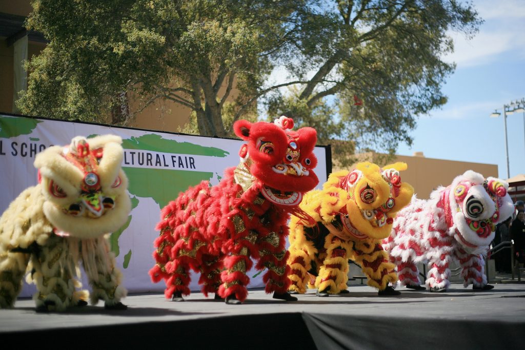 Ane Thanh’s Chinese Lion Dancers perform on stage at the 16th Annual Sage Hill School Multicultural Fair on Saturday. — Photo by Sara Hall ©