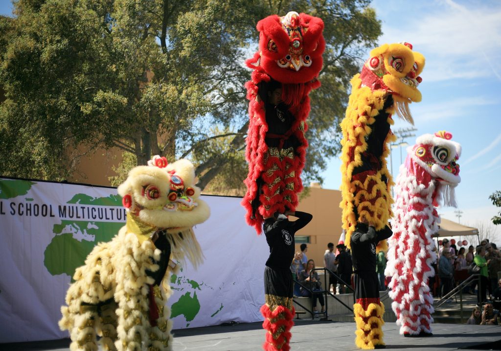 Ane Thanh’s Chinese Lion Dancers perform on stage at the 16th Annual Sage Hill School Multicultural Fair on Saturday. — Photo by Sara Hall ©