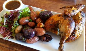 Half chicken with fingerling potatoes at Moulin