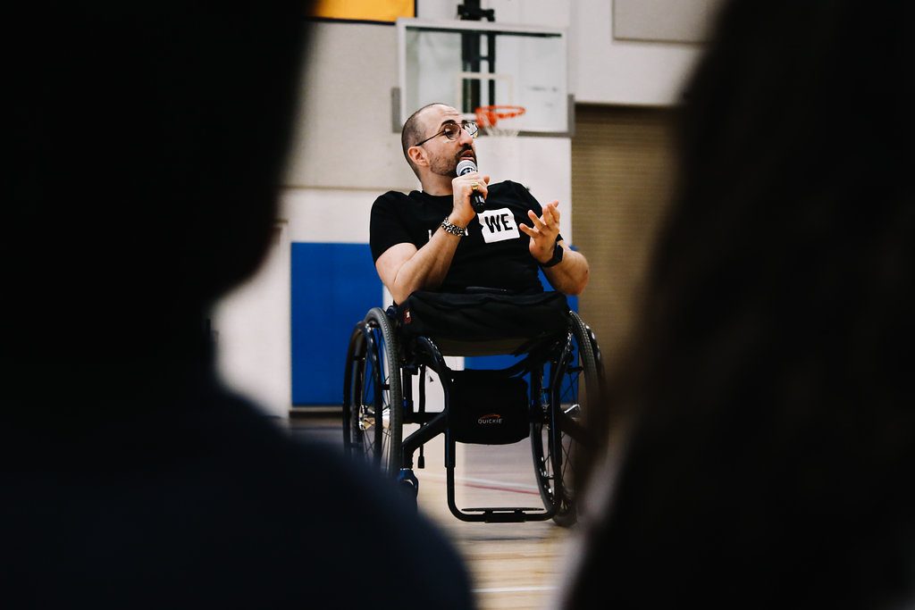 Spencer West speaks at Harbor Day School during an event on March 8.  — Photo by Chase Hall ©