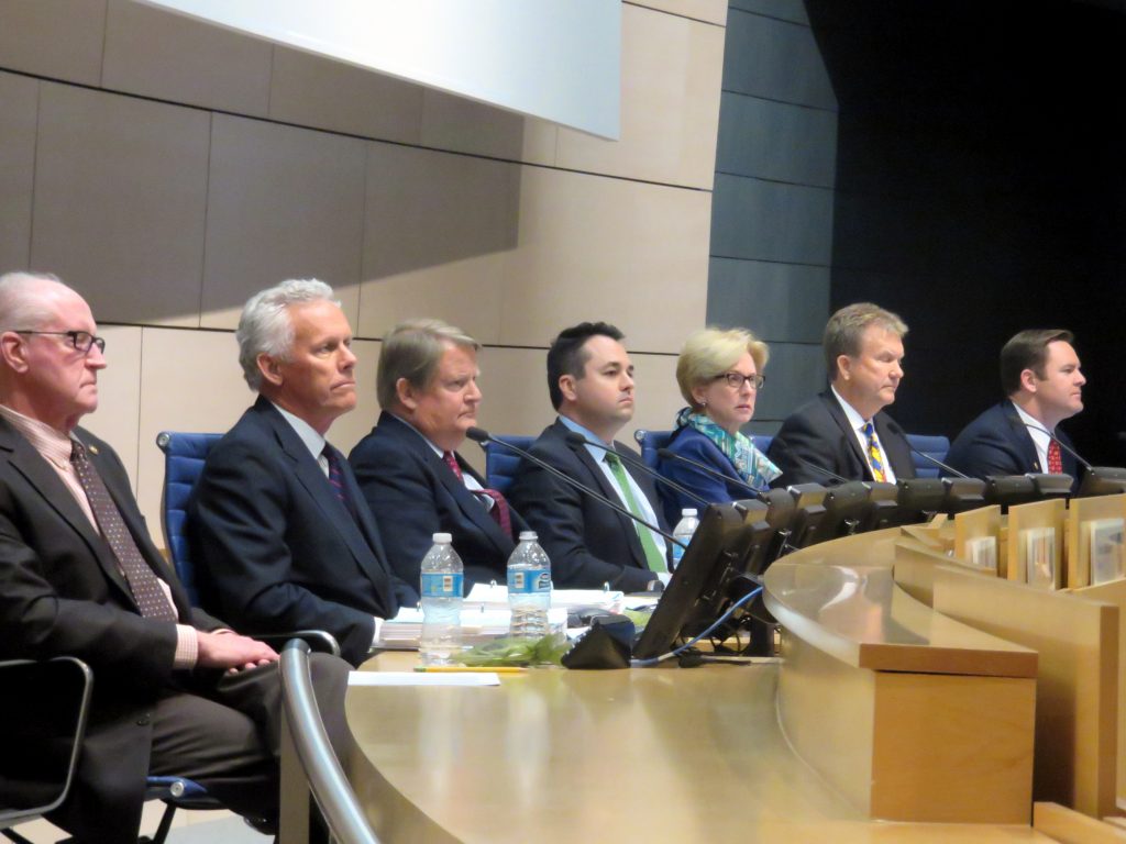 Members of the Newport Beach City Council (left to right) Jeff Herdman, Brad Avery, Mayor Pro Tem Marshall “Duffy” Duffield, Mayor Kevin Muldoon, Diane Dixon, Scott Peotter, and Will O’Neill  listen as residents explain their reasons for a recall effort of Peotter. — Photo by Sara Hall ©