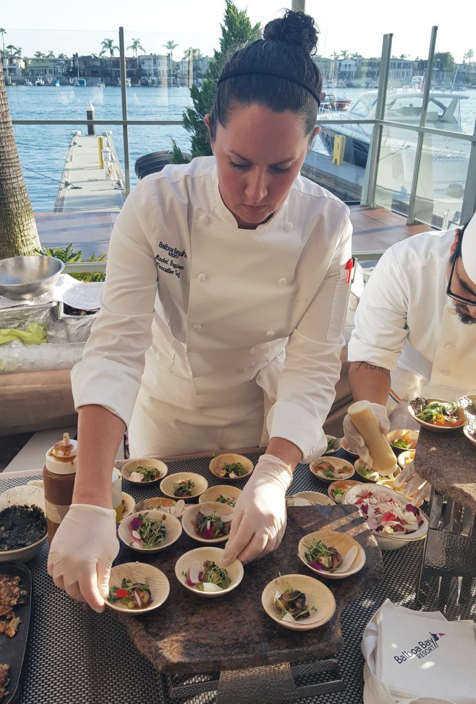 Chef Rachel Haggstrom prepares cuisine for the Honors Reception at Balboa Bay Resort