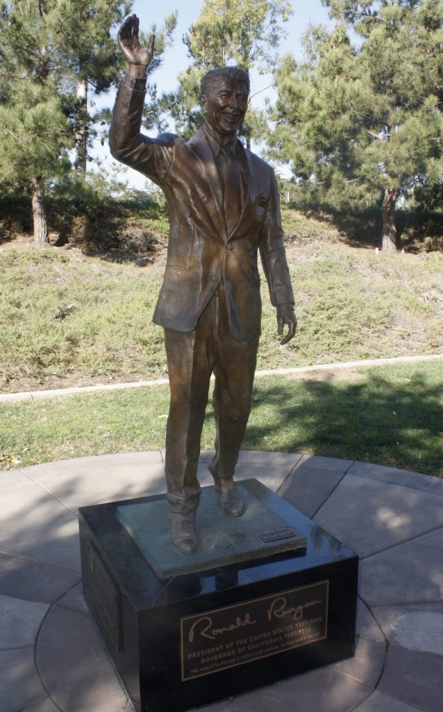 The statue of Ronald Reagan, which has resided in Bonita Canyon Sports Park since 2011, will be moved to Civic Center Park as part of a special condition on a City Council item regarding the Arts Commission on Tuesday night.  — NB Indy file Photo ©