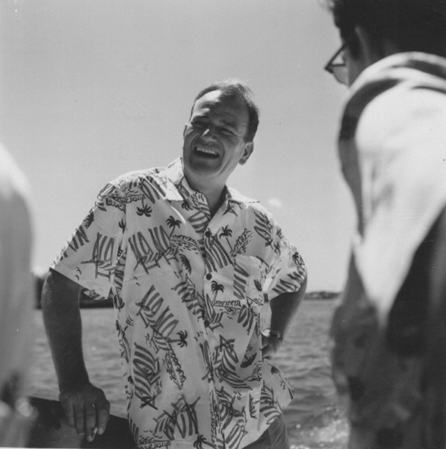 John Wayne casually dressed and enjoying time aboard his boat, the Wild Goose, with friends and family. — Photo courtesy John Wayne Enterprises ©