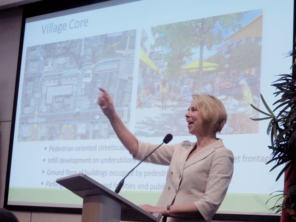 Kim Brandt, the city’s community development director, speaks to the crowd at the Newport Beach Chamber of Commerce’s monthly Wake Up! meeting on Thursday about Mariners’ Mile Master Plan, the Balboa Peninsula Trolley, and short-term vacation rentals. — Photo by Sara Hall ©