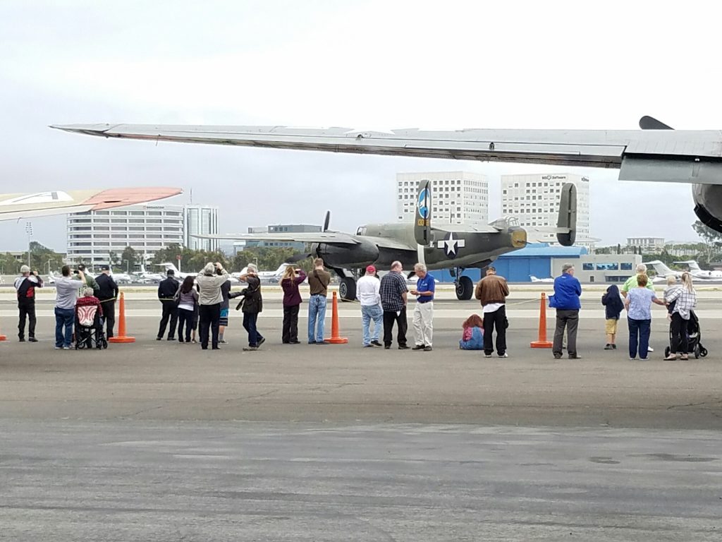 The crowd watches departing aircraft on Wednesday. — Photo by Jim Collins ©