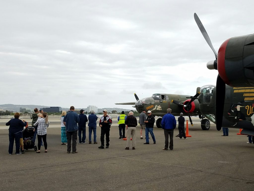 The crowd watches some of the historic planes on Wednesday. — Photo by Jim Collins ©