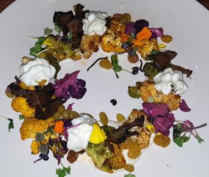 Roasted cauliflower with maitake mushrooms and golden risins